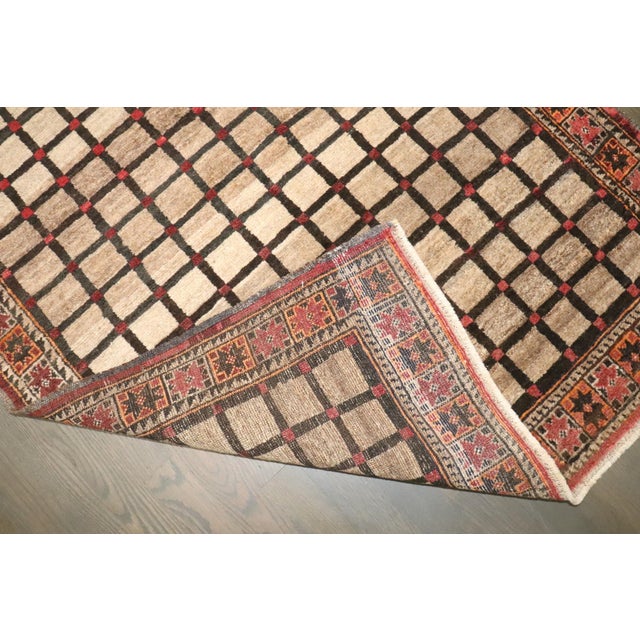 A vintage mid 20th century Afghan Balouch small square Rug