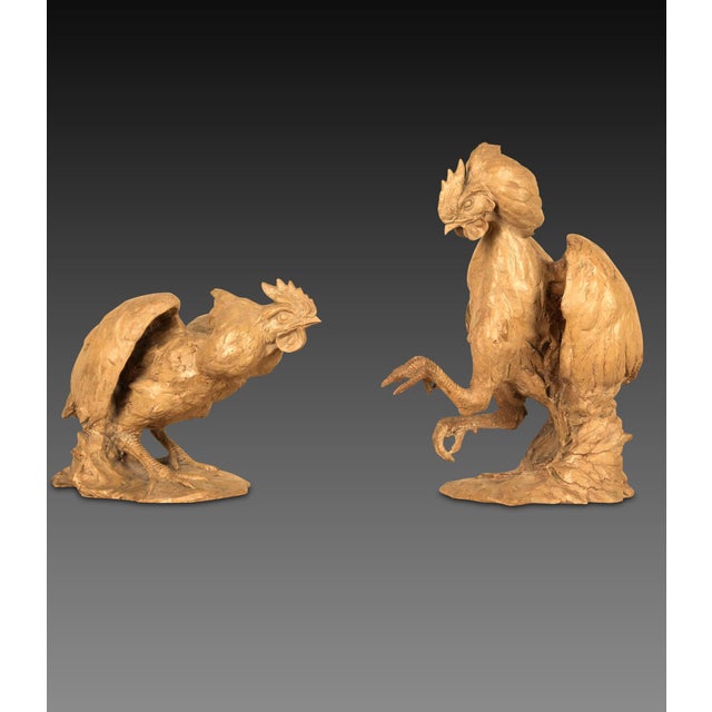 A lively pair of 19th Century Sculpted terracotta Cockerels, finely executed in action poses. Circa 1850. Finished in a...