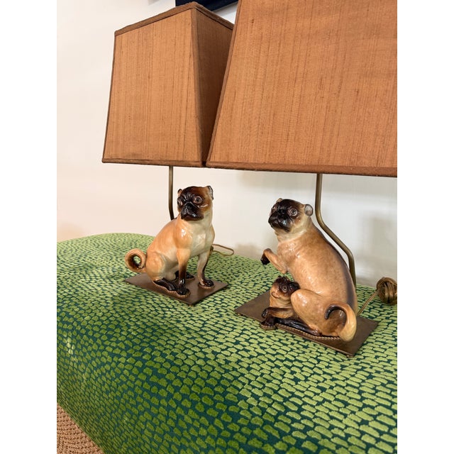 Wonderful, large pair of 19th century Meissen porcelain figures of pug dogs, one with child. Gorgeous condition and these...