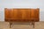 The highboard manufactured by the Danish manufacturer Farso Mobelfabrik in the 1960s. This piece of teak furniture...