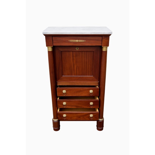 Magnificent Empire-style mahogany veneer secretary desk with six drawers, brass fittings, and a white marble top, in...