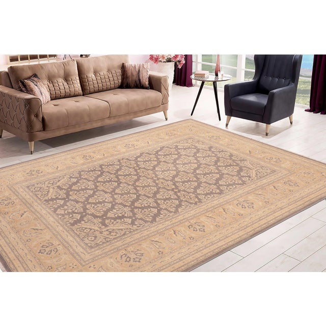 Enhance the ambiance of your home with this magnificent Persian-influenced Turkish hand-knotted rug made by skilled...