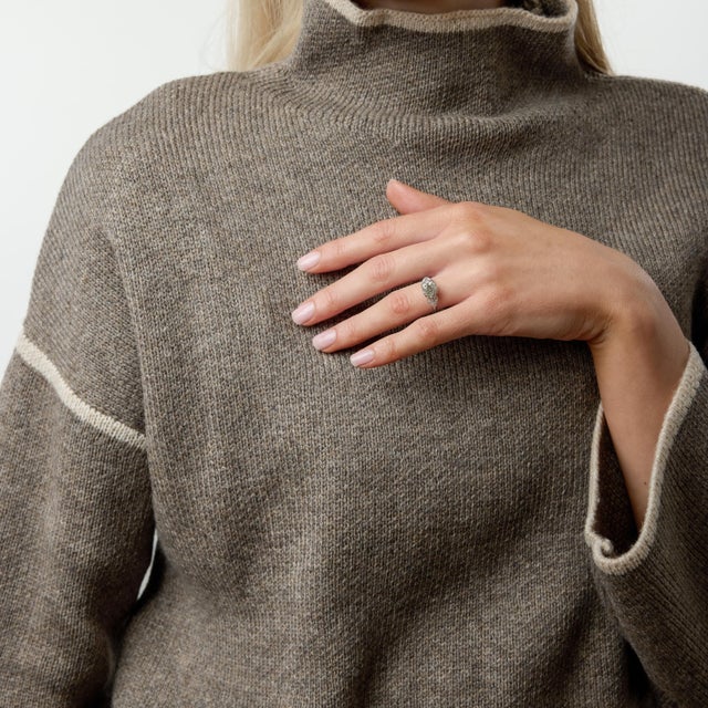 A captivating embodiment of 1930s romance, this authentic Art Deco engagement ring showcases a remarkable 1.75 carat old...