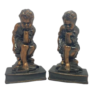 Mid 20th Century Cast Metal With Bronze Tone Bookends With Thinking Boy Sitting on Stack of Books Design - a Pair