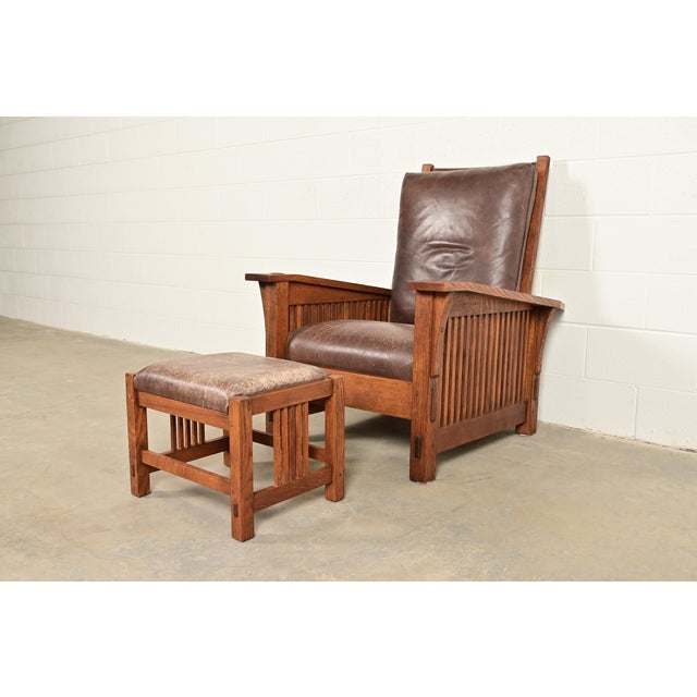An exceptional Mission or Arts & Crafts Morris reclining lounge chair with ottoman By L. & J.G. Stickley USA, 1997 Solid...