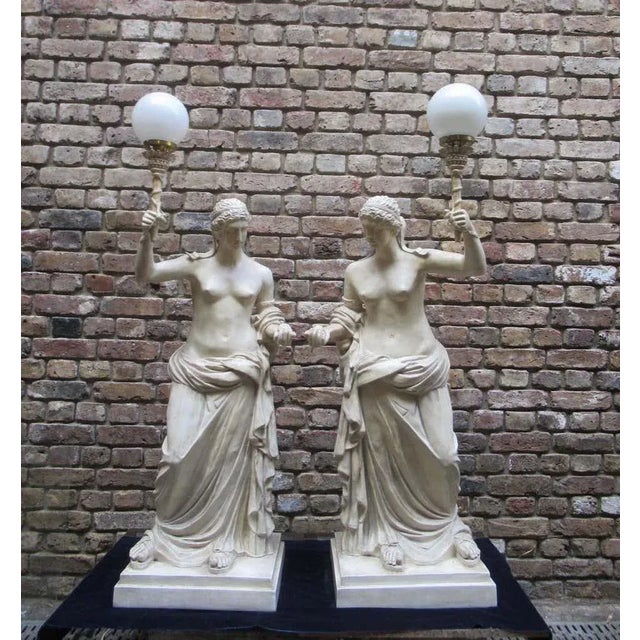 Pair of 20th century vintage christopher wray plaster figural lamps depicting roman women, signed by artist. M. Osman. H...