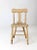 This is an antique wooden dining chair. The rustic plank seat chair features a decorative fiddle back. Aged, cream paint...