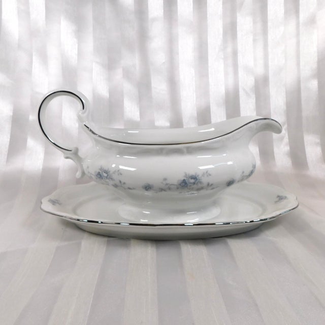 This is a Johann Haviland gravy boat in Blue Garland with a Bavaria backstamp that comes with the original box. I do not...