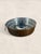 An antique English tin-plated mould dating to circa 1900, featuring a beautifully fluted design with a domed center....