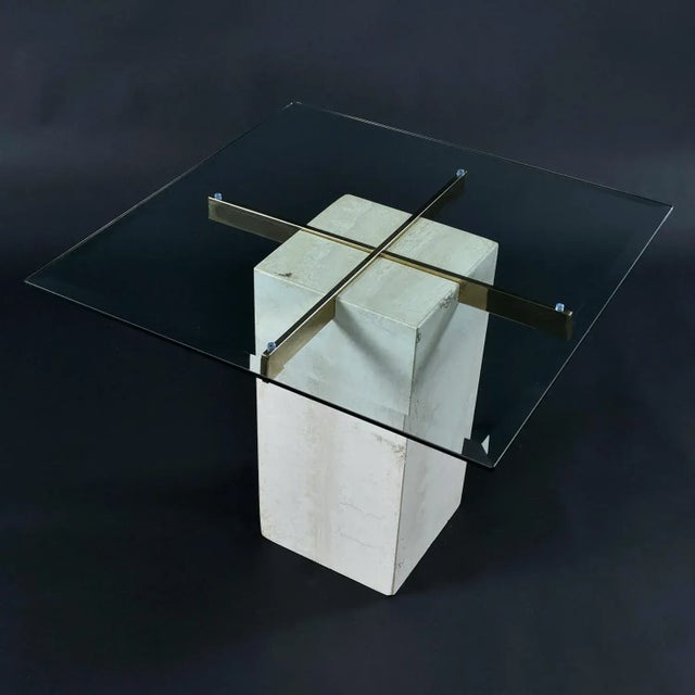 Stunning travertine stone square pedestal cocktail table in the style of Maitland-Smith. Super-sleek, elegant and Classic...