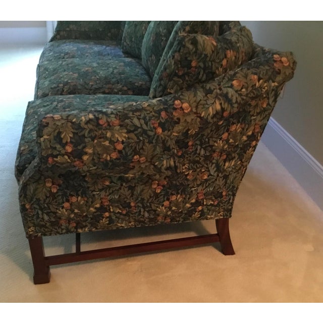 Elevate your living space with this exceptional, custom-upholstered camelback sofa by the prestigious Hickory Chair...
