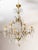 A french louis xv style chandelier with various pendants and finials, six candlestick holders fully rewired and six light...