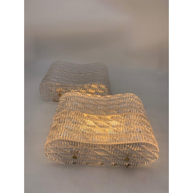 Fantastic pair of handcrafted wall lights with Murano glass; Lamp created with the collaboration of the Murano masters....