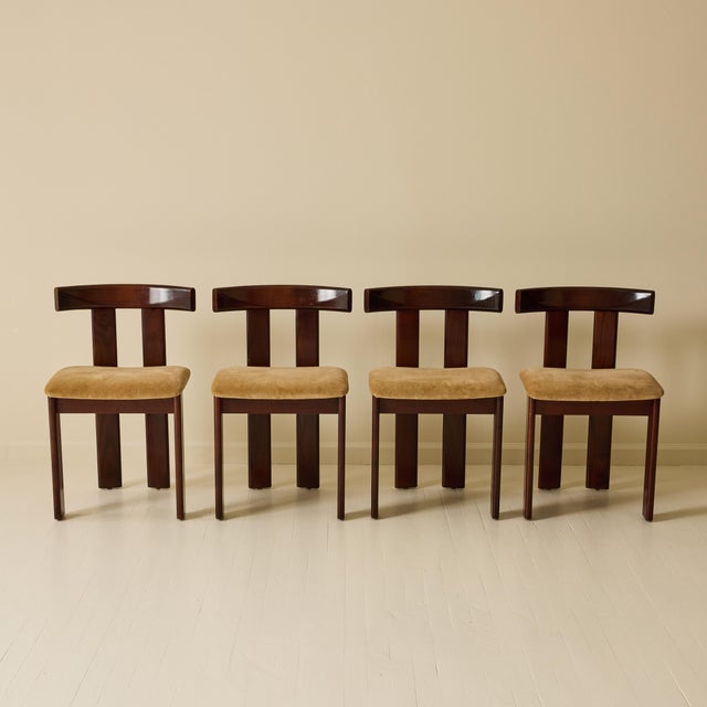 Set of four chairs from Luigi Vaghi's Euro series, produced by Former, mid 1970's. Made in stained walnut with camel...