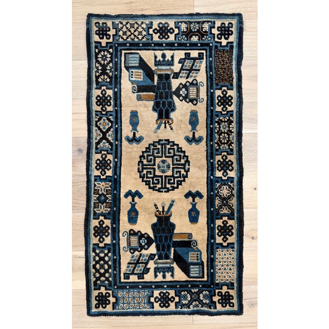 Antique Chinese Peking rug, hand-knotted in wool on a cotton foundation, China, early 20th century. The rug features an...