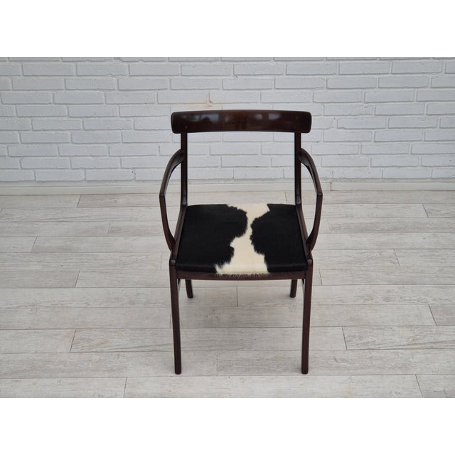 1960s, Danish design by Ole Wanscher for P. Jeppesnes Møbelfabrik. Reupholstered armchair in quality furniture cowhide....