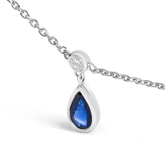Contemporary 10K White Gold Dangling 5x3 mm Pear Blue Sapphire and Diamond Station Necklace - 18" Inches For Sale - Image 3 of 5