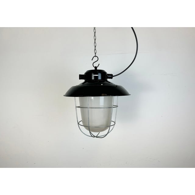 - Vintage industrial lamp made by Elektrosvit in former Czechoslovakia during the 1960s - Black enamel shade with white...