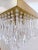 Modern upside down layered cake chandelier with Straus faceted crystal drops. It has 3 light and it was design by Lato...