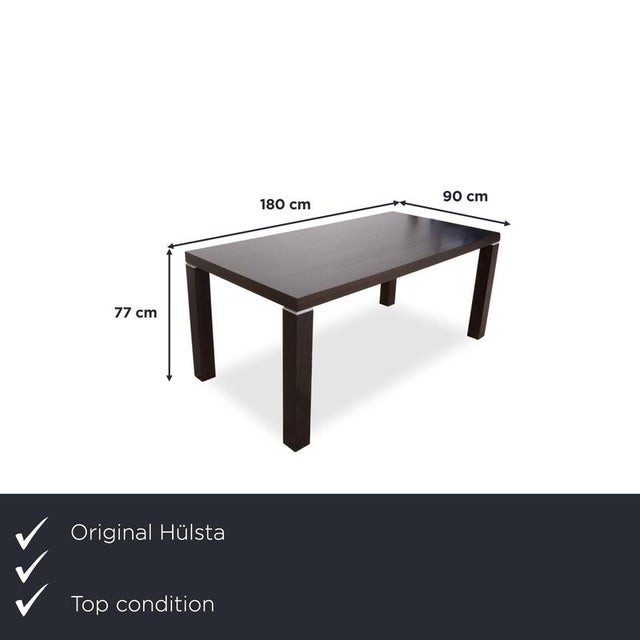 with this dining table from hülsta, you're getting a solid wood piece of furniture with a clean, linear design. The four...