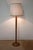 Large beech standing lamp, with a unique design, embellished with copper rings. This floor lamp has a cylindrical barrel...
