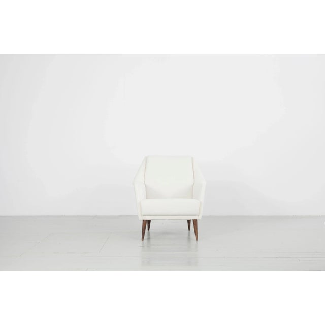 Model 802 armchair - design by carlo de carli, manufactured by cassina, italy, 1954. The wooden frame with foam upholstery...
