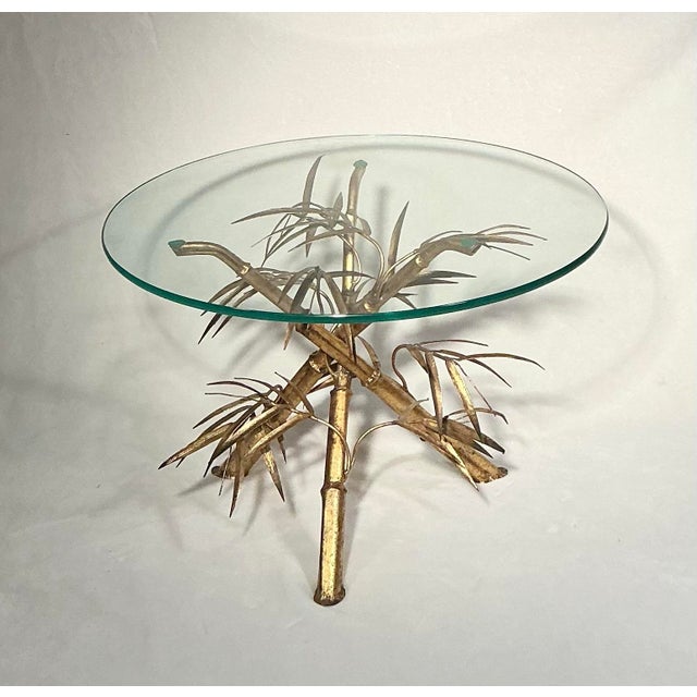 Circa 60s-70s, Italian glass top side table. Manufactured in Italy. Mid-Century Hollywood Regency style, Gilt Metal...