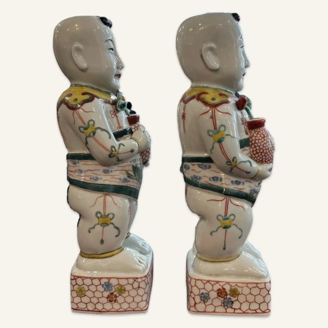 Chinese Pair of Late 19th Century Famille Verte Reproduction Porcelain Boys Holding Lotus Flowers For Sale - Image 3 of 6