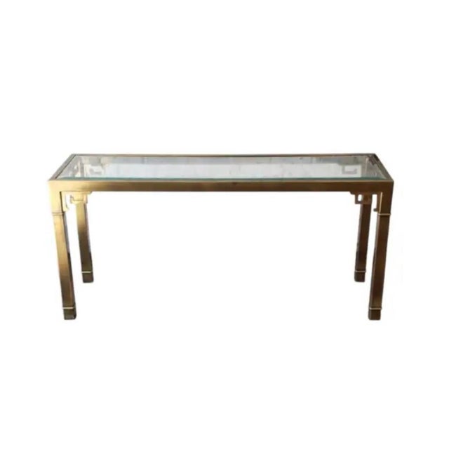 Vintage Mid Century Mastercraft Brass and Glass Console Table featuring the Greek Key Motif. Table features polished brass...