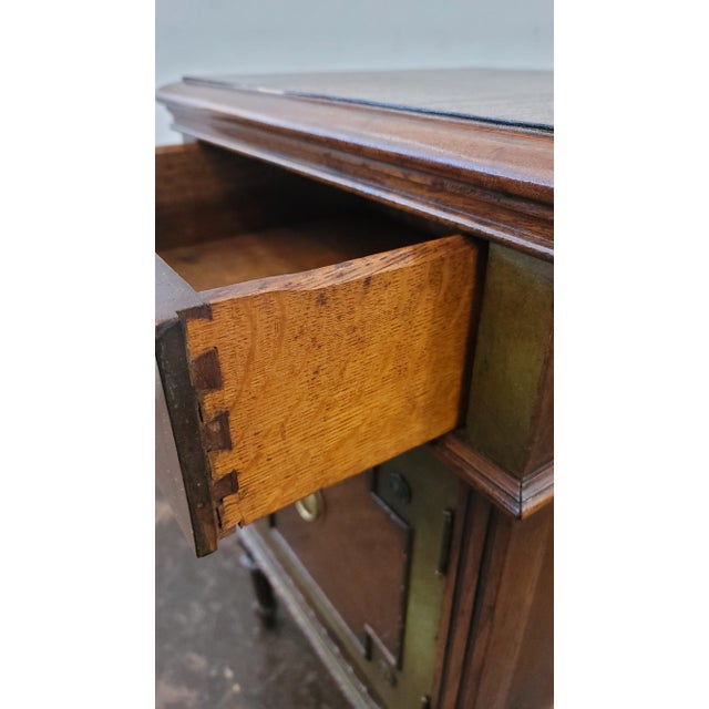 A nice walnut with hand painted flowers and finish. Made by Rockford Furniture in the 1920s. Heavy and well made....