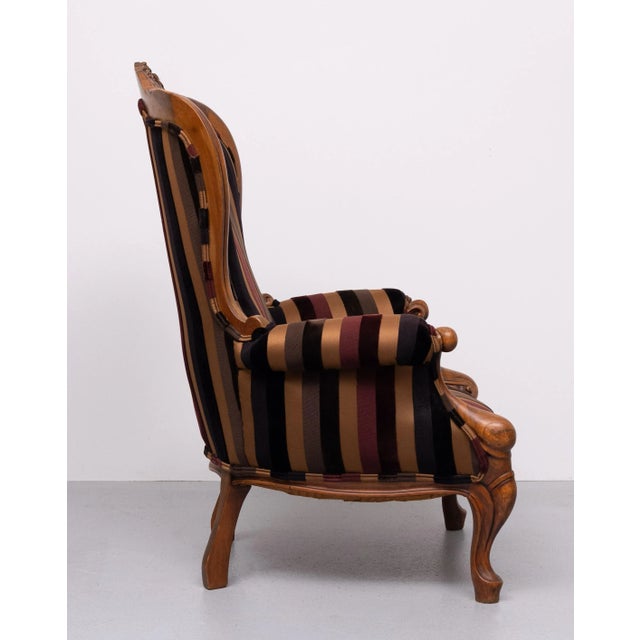 What a top combination on this Antique easy chair with Paul Smith fabric upholstery . professional done . with singles and...