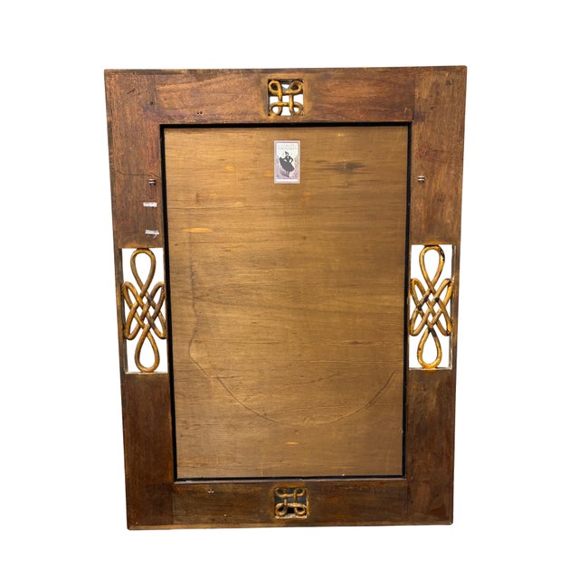 Impressive oversized wall mirror by Harrison & Gil for Dauphine, featuring a richly carved architectural wood frame with...