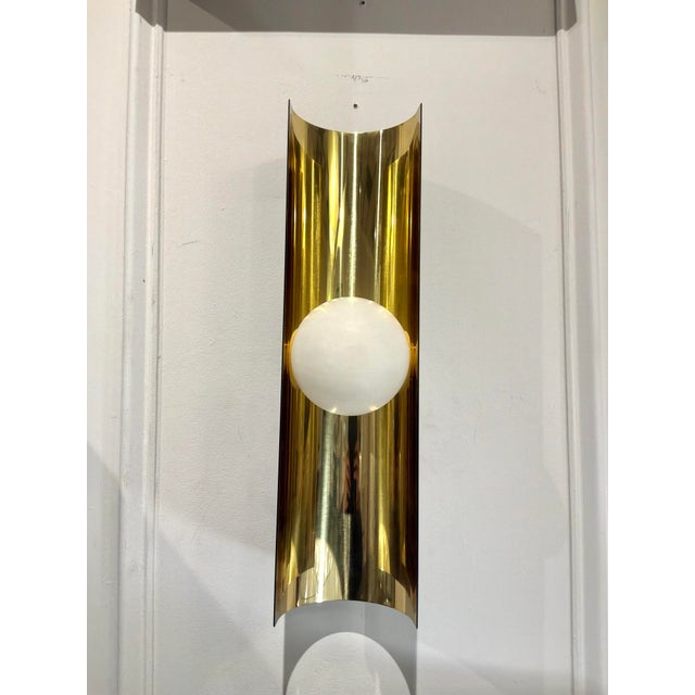 Modern Baker Jean Louis Denoit Regmalypte Sconces. White Marble shade, gold/black frame. Original Retail $3447 each....