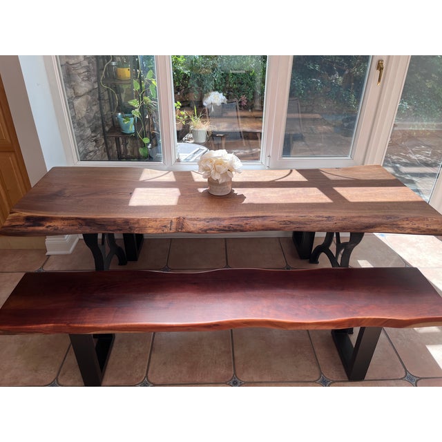 This beautiful custom live edge table was personally designed by us. The walnut slab was purchased from Williard Brothers...