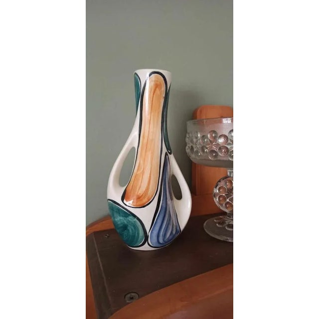 A decorative vase, hand-painted, from the Włocławek faience factory from the 1960s. Pattern 284. Jan Sowiński designed for...