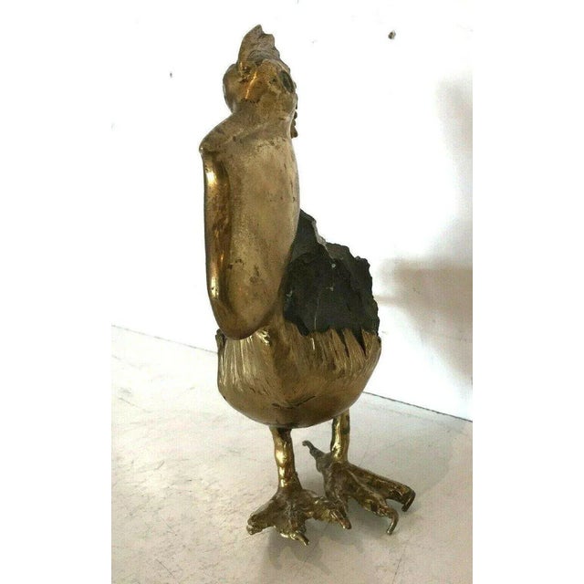 Gilded bronze sculpture group Representation of a pelican. Bears an "undeciphered" signature. Good condition, 20th...