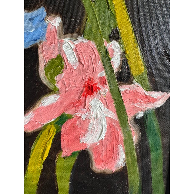 "Irises in Fading Light" is rendered on an 8" x 8" canvas and measures 9" x 9" including modern floater frame. It is a...