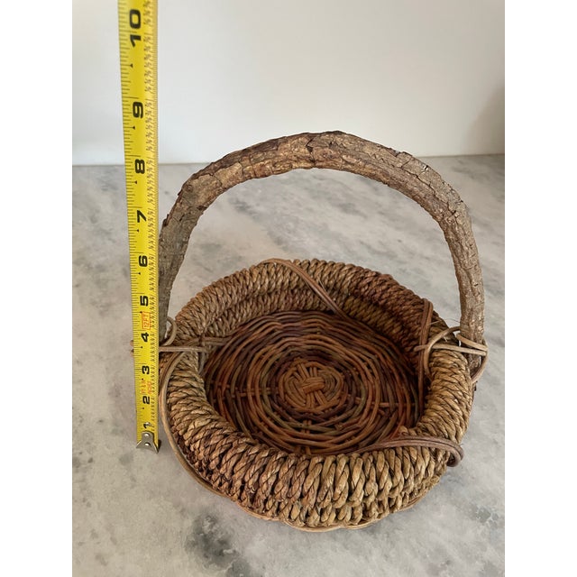Early 20th Century Vintage Rustic Woven Basket With Branch Handle For Sale - Image 5 of 7