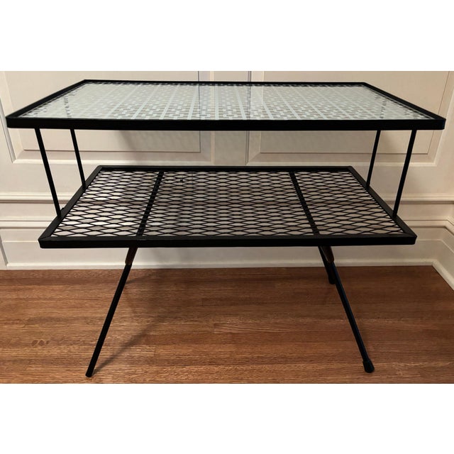 Very stylish Mid-Century modern side table with geometric pattern laminated acrylic top. Will elevate any outdoor space....