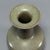 Classic Chinese official‑style celadon disk‑mouth vase, with flat wide disk rim, tall straight neck and stout rounded...