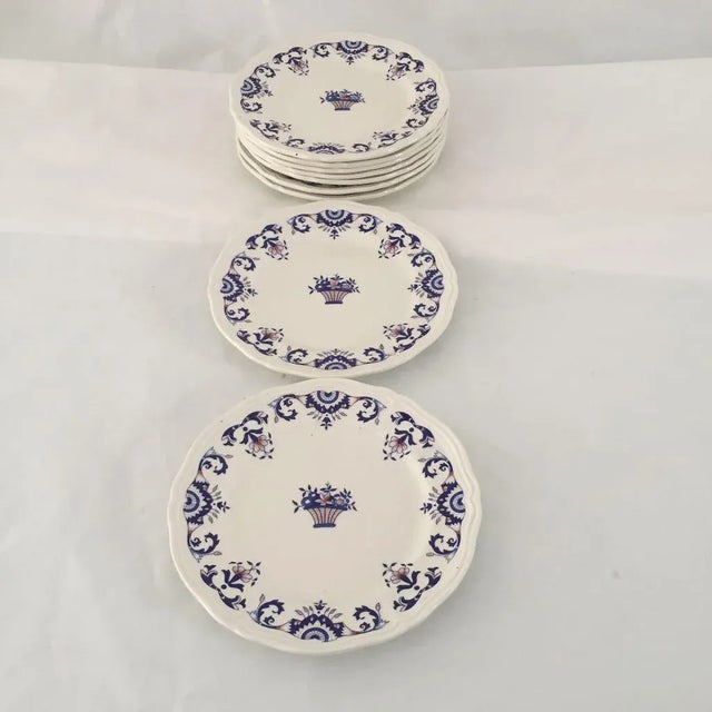 Beautiful, vintage hand painted, signed by the artist set of nine salad 8"D plates Makers mark reads " Rovennau Hand...