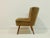 This vintage cocktail chair is a charming original from the 1960s, boasting a classic mid-century silhouette and...
