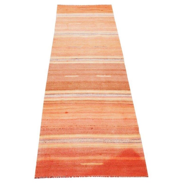 Hand-knotted with care using traditional rug-making techniques, this wool rug blends timeless craftsmanship with a modern...