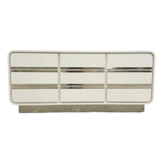 Postmodern Cream Gloss Laminate Waterfall Dresser With Gold Accents For Sale