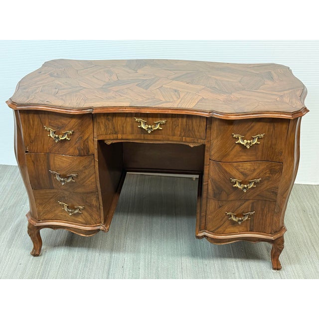 Design Plus Gallery presents an Olive Wood Pedestal Desk with an Italian Rococo Design. The desk has curved serpentine...