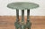 A contemporary verde bronze side table with pie crust top, fluted legs and reversed scroll feet. Created with the...