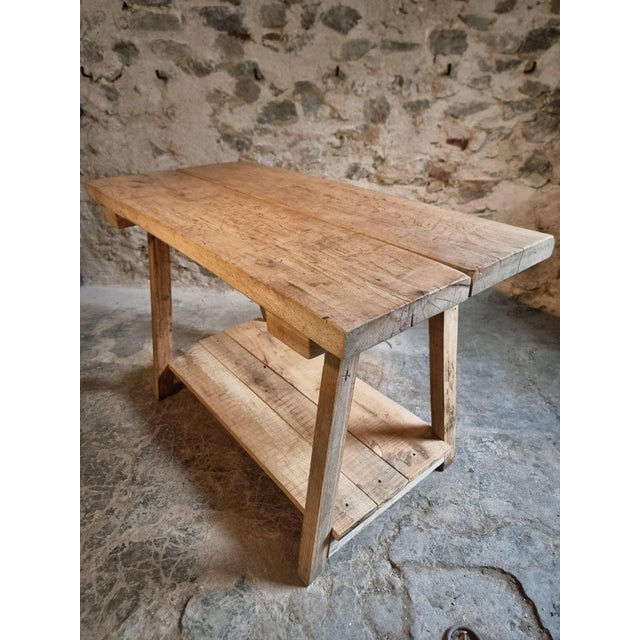 French work table dating from approximately 1930–1950, sourced from a farmhouse in France. The table has a simple,...