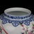 Elegant Chinese chinoiserie lidded general jar blending blue‑and‑white border ornamentation with vibrant famille‑style...