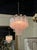 Modern Murano "tronchi" style pink glass chandelier. The chandelier has been professionally rewired, comes with matching...