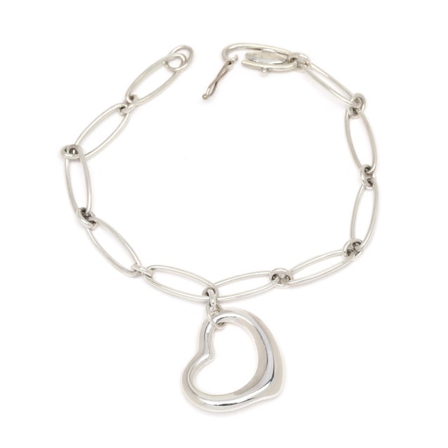 Length: 7.5 in. Pendant Length: 7/8 in. Width: 5.7 mm Weight: 6.4 dwts. / 10 grams Stamps: "925 Tiffany & Co" Elsa Peretti...